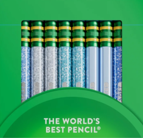 A green cardboard pencil box containing six pencils in colorful metallic shades of metallic and glitter blues with green erasers with yellow details on the metal. 